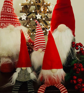 Add a touch of Scandi this year with our adorable plush Santa's